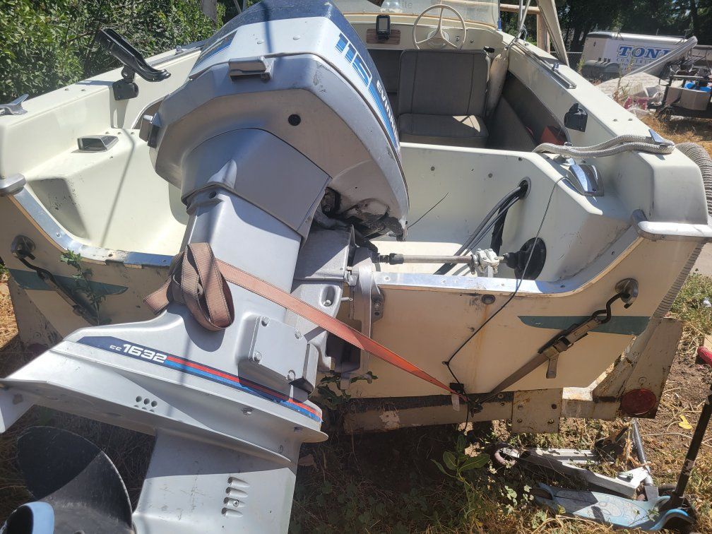 Used Cancun Kid Boat with Outboard Motor and Trailer