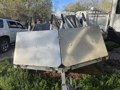 Trailer and snowmobiles