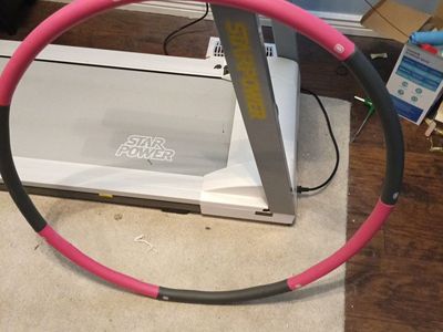 Treadmill and weighted hula hoop