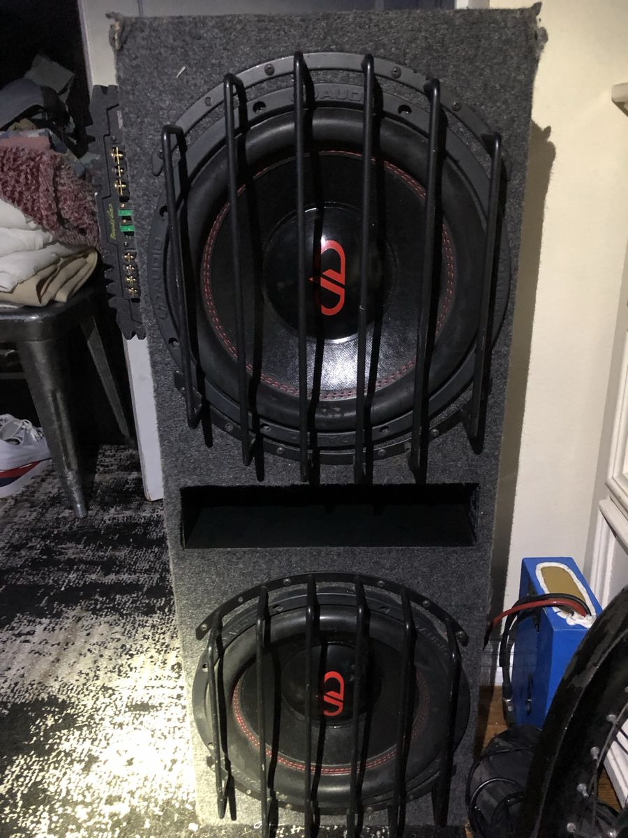 DD Audio Dual Subwoofers in Ported Enclosure with Protective Grills and Side-Mounted Amplifier