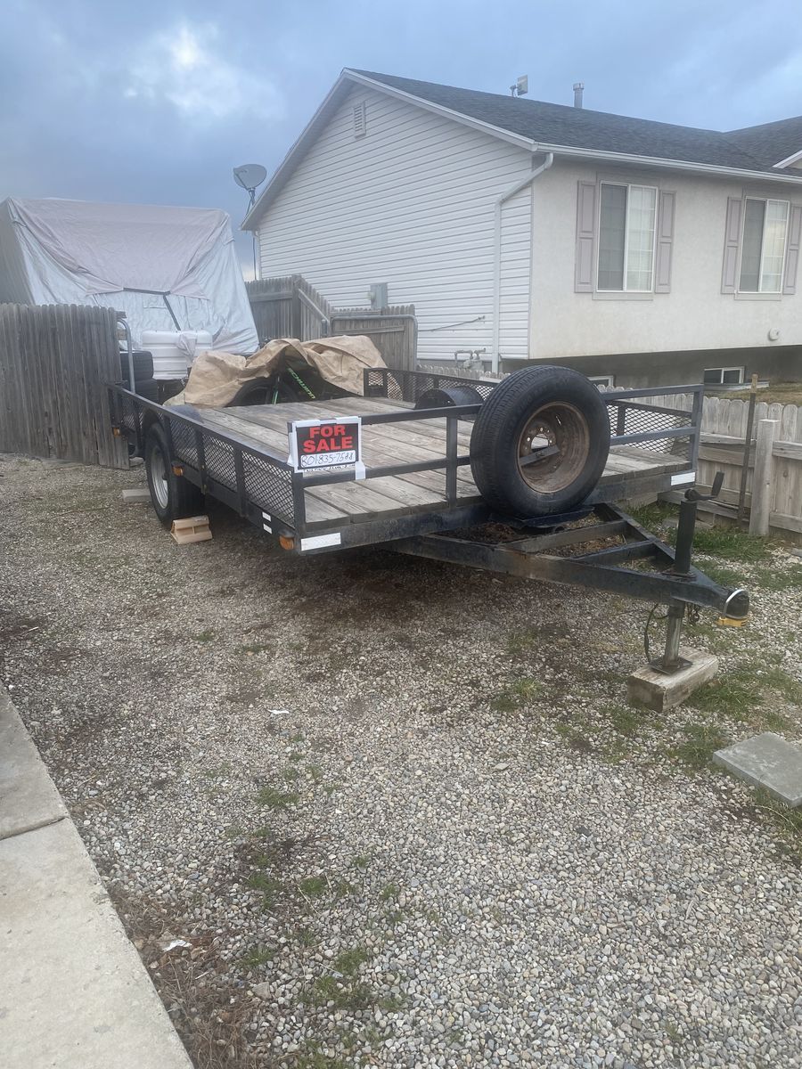 7 1/2 x 12 open trailer with ramp in good condition