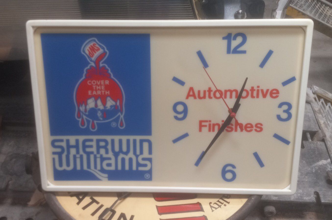 Sherwin Williams cover the earth clock