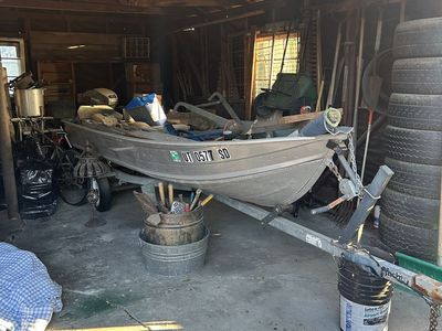 Fishing boat w/motor and trailer