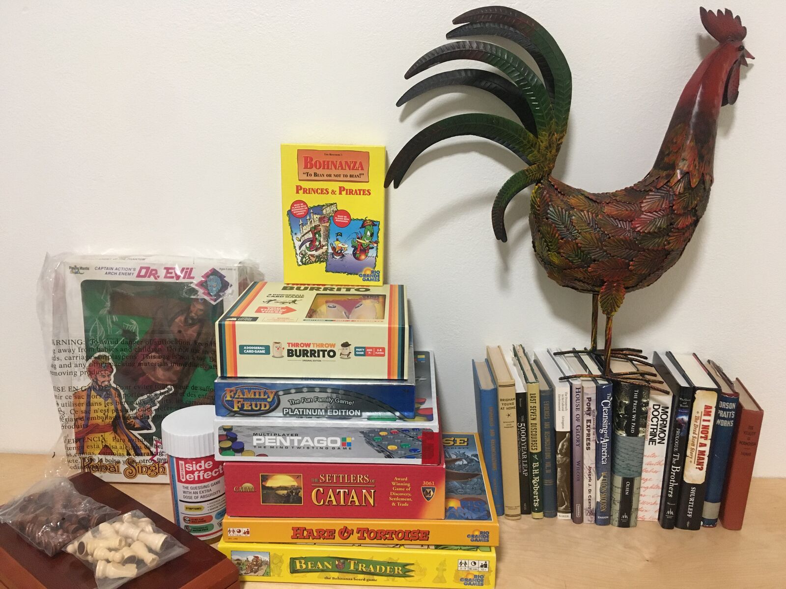 Books and Board games and 1 Cute Metal yard Rooster 385-528-5047   ?