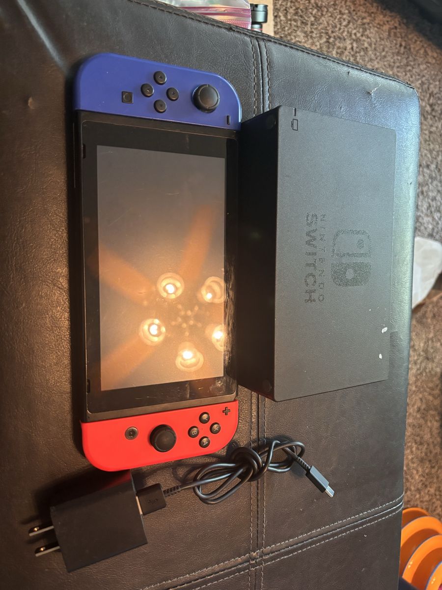 Nintendo Switch Console with Dock and power cord- Play On The Go or At Home