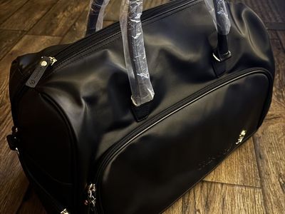 Orkai Wheeled Duffle ( Roller Bag)