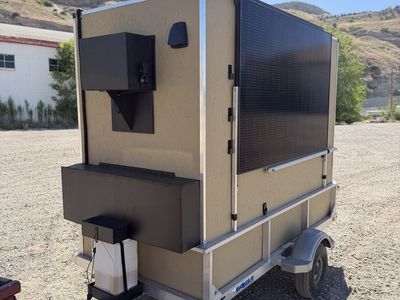 eDirt Moto trailer with heat, a/c, power system, kitchen, fridge