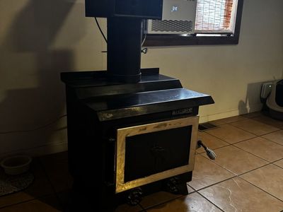 Black Wood Burning Stove with Blower Fan and Flue Pipe