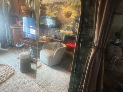 Rounded large mirror