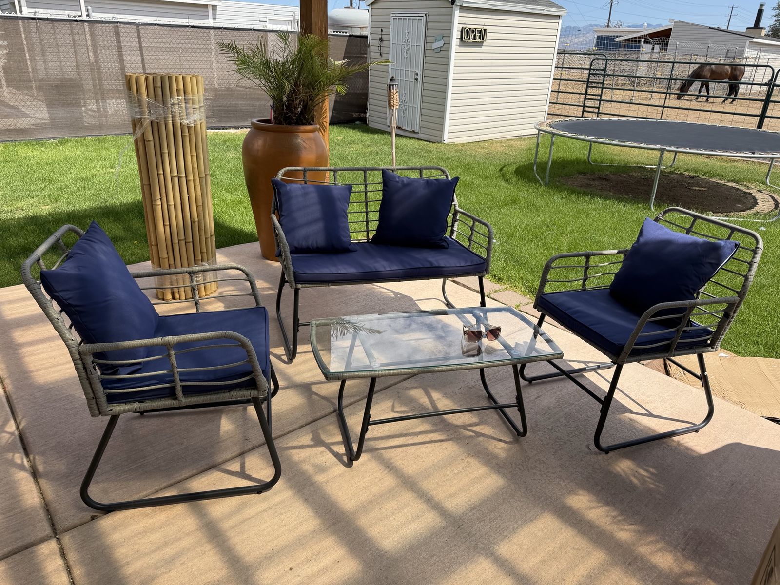 Patio Conversation Set with Loveseat, 2 Chairs, and Glass-Top Table