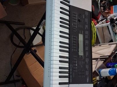Casio WK-220 76-Key Portable Arranger Keyboard with Touch Response & Sampling