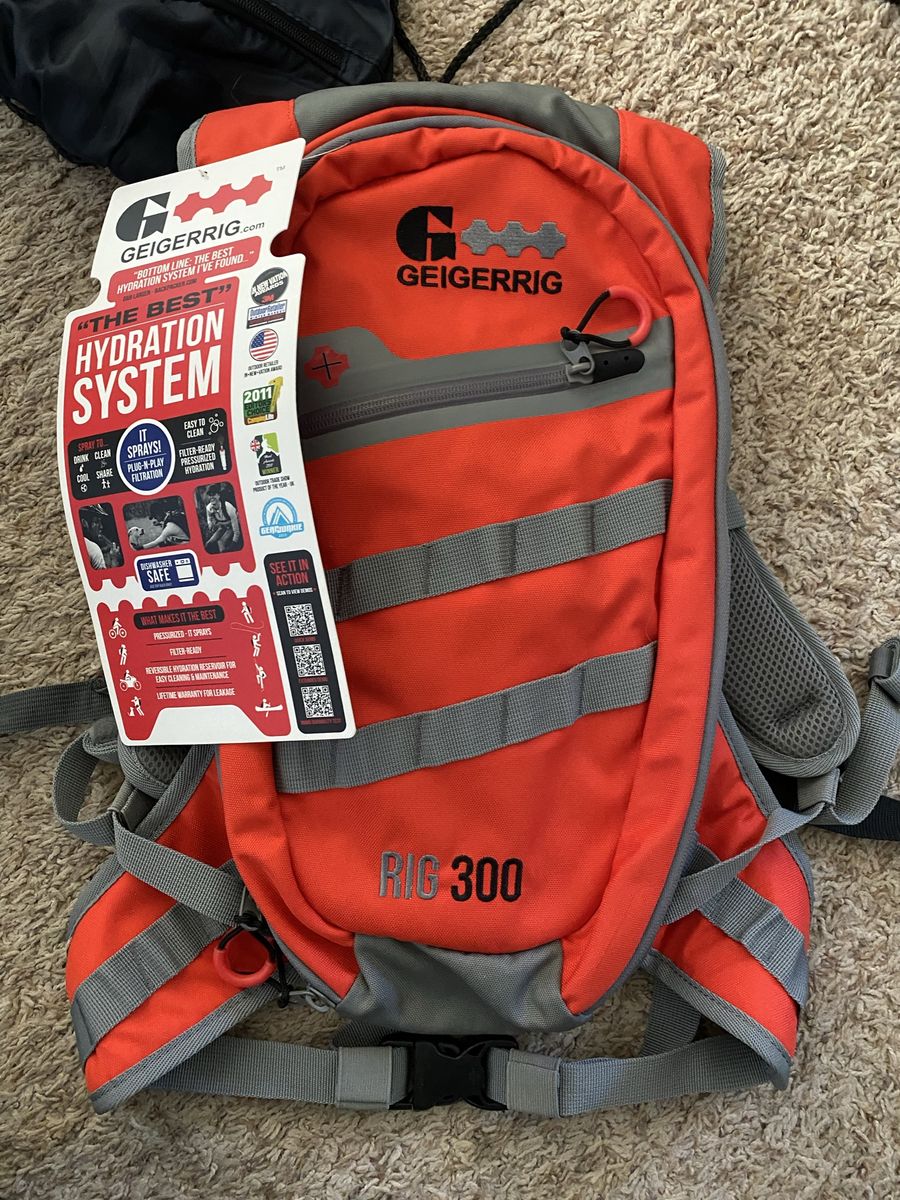 GEIGERRIG RIG 300 Pressurized Hydration Pack - Orange/Gray - New with Tags