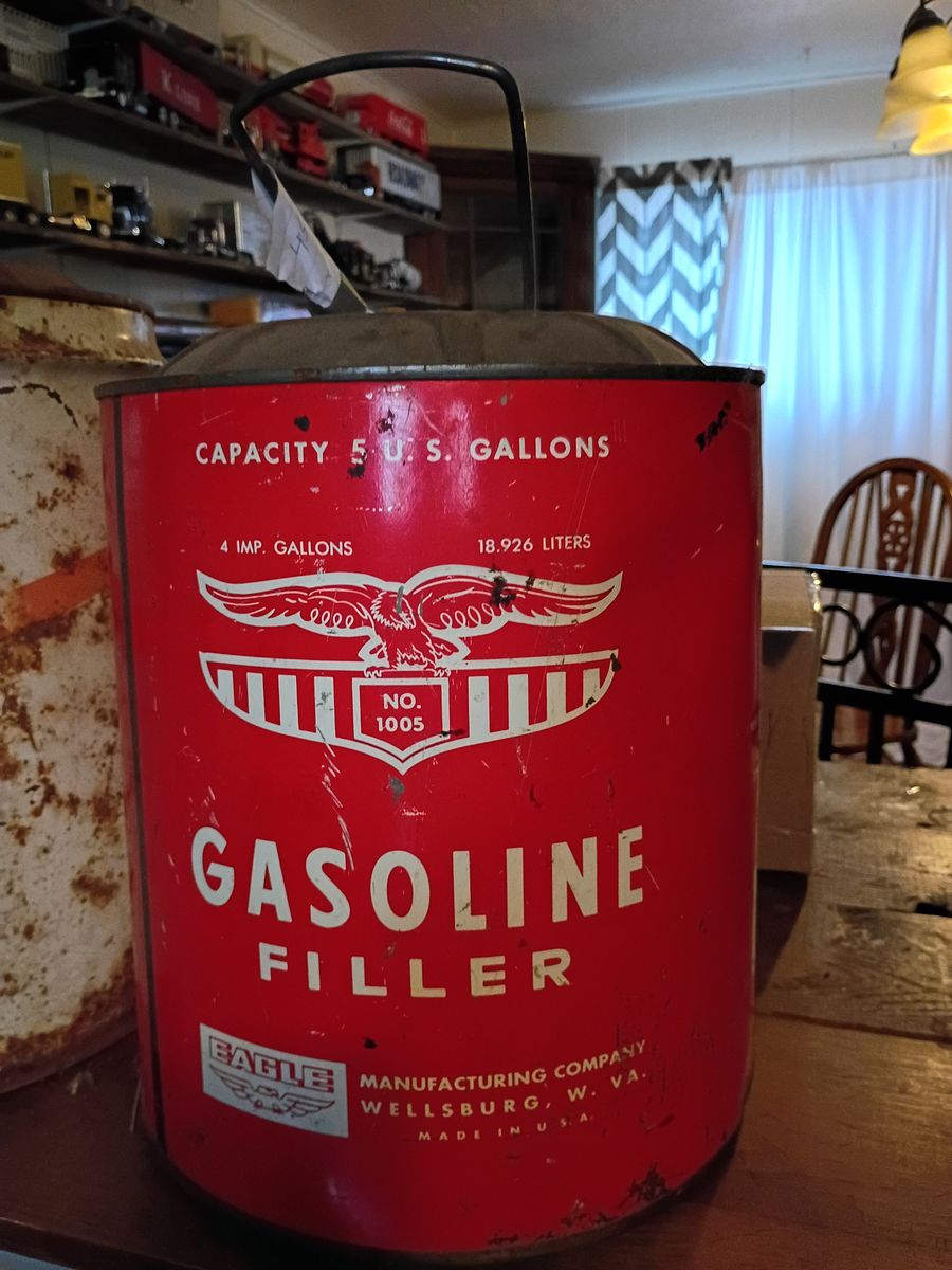 Antique 5 gal oil cans