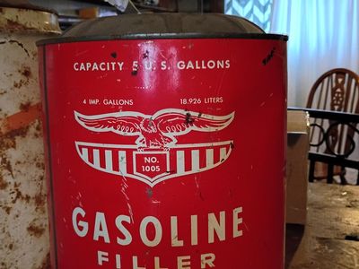 Antique 5 gal oil cans