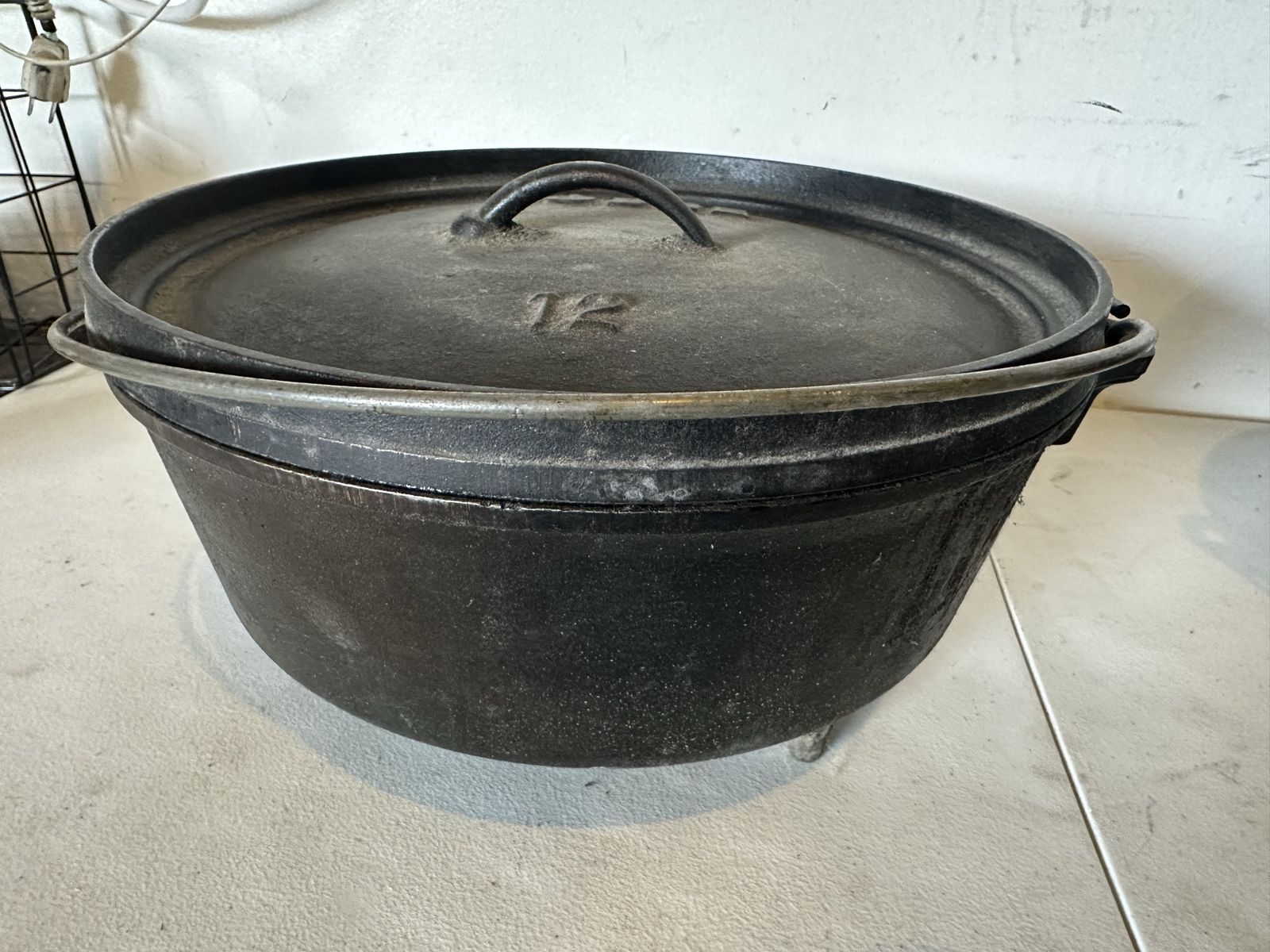 Lodge 6 Quart Pre-Seasoned Cast Iron Deep Camp Dutch Oven with Lid