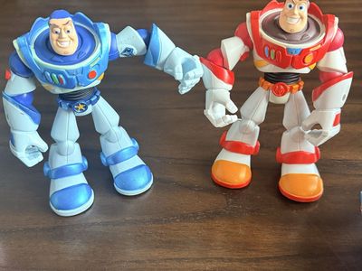 Disney Pixar Toy Story Buzz Lightyear Action Figures Set of 2 Vintage toys (Space defender in blue and Fire fighting red leader)