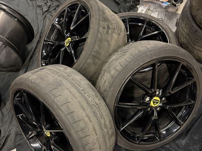 OEM Lotus 20 Inch Gloss Black Wheels with Dunlop Tires Set of 4 (245/35ZR20)