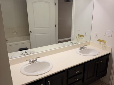 Master Bathroom, with sinks, countertops, shower, Cabinets