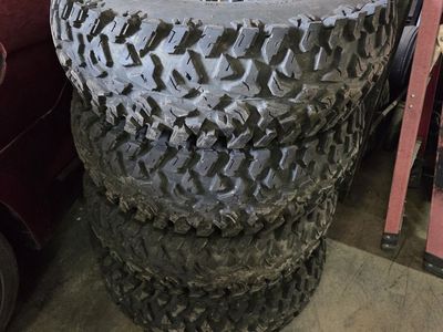 Side by side wheels & tires they are off a machine that was only used for 3 days then went bigger