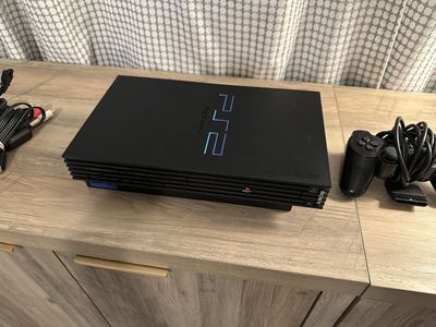 NEW OLD STOCK, PS2 Console + two Controllers