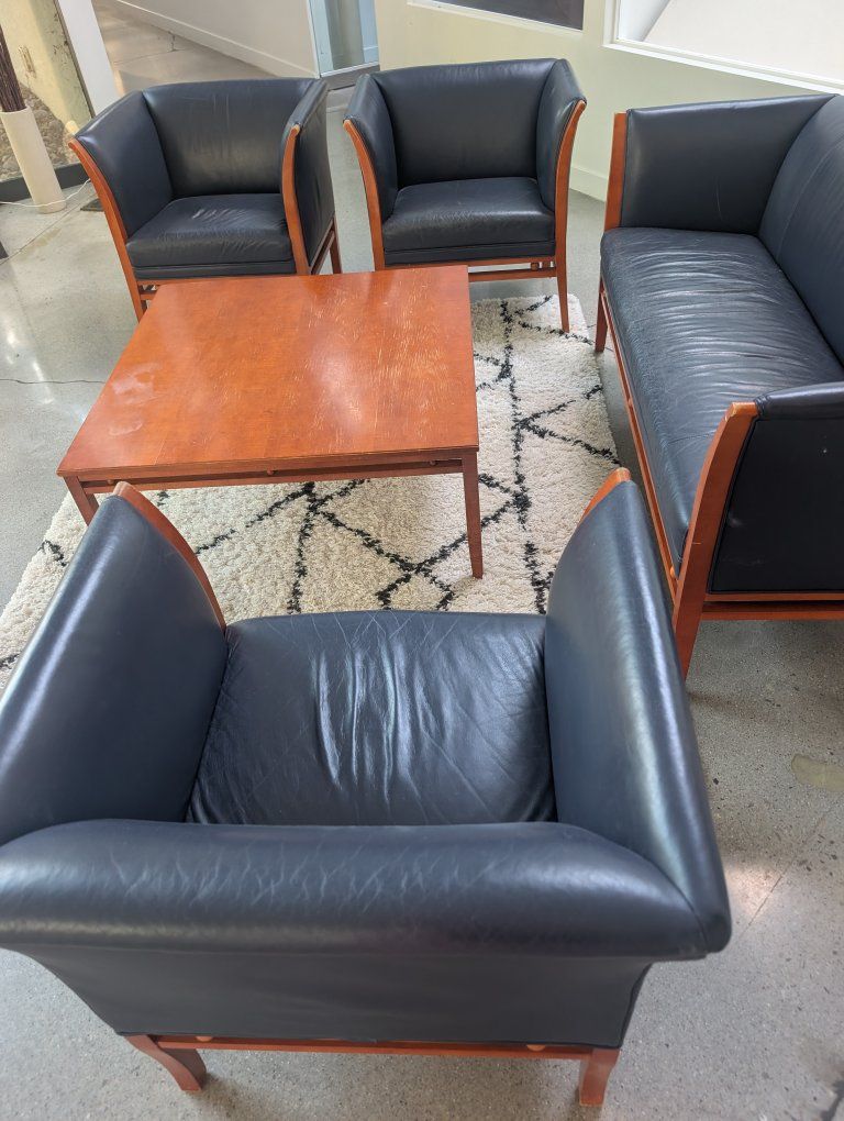 Leather and Wood seating set and table 