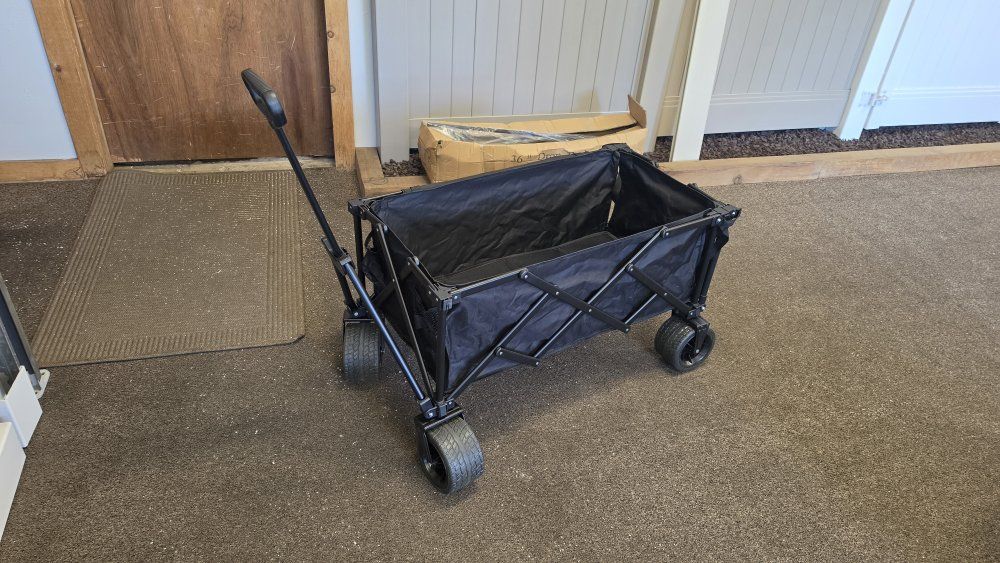 Black Foldable Utility Wagon with Extended Tailgate and All-Terrain Wheels