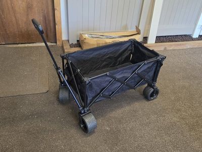 Black Foldable Utility Wagon with Extended Tailgate and All-Terrain Wheels
