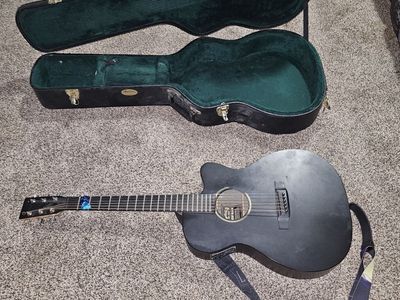 Martin 000CXE Black Acoustic-Electric Guitar with Hard Case and Strap
