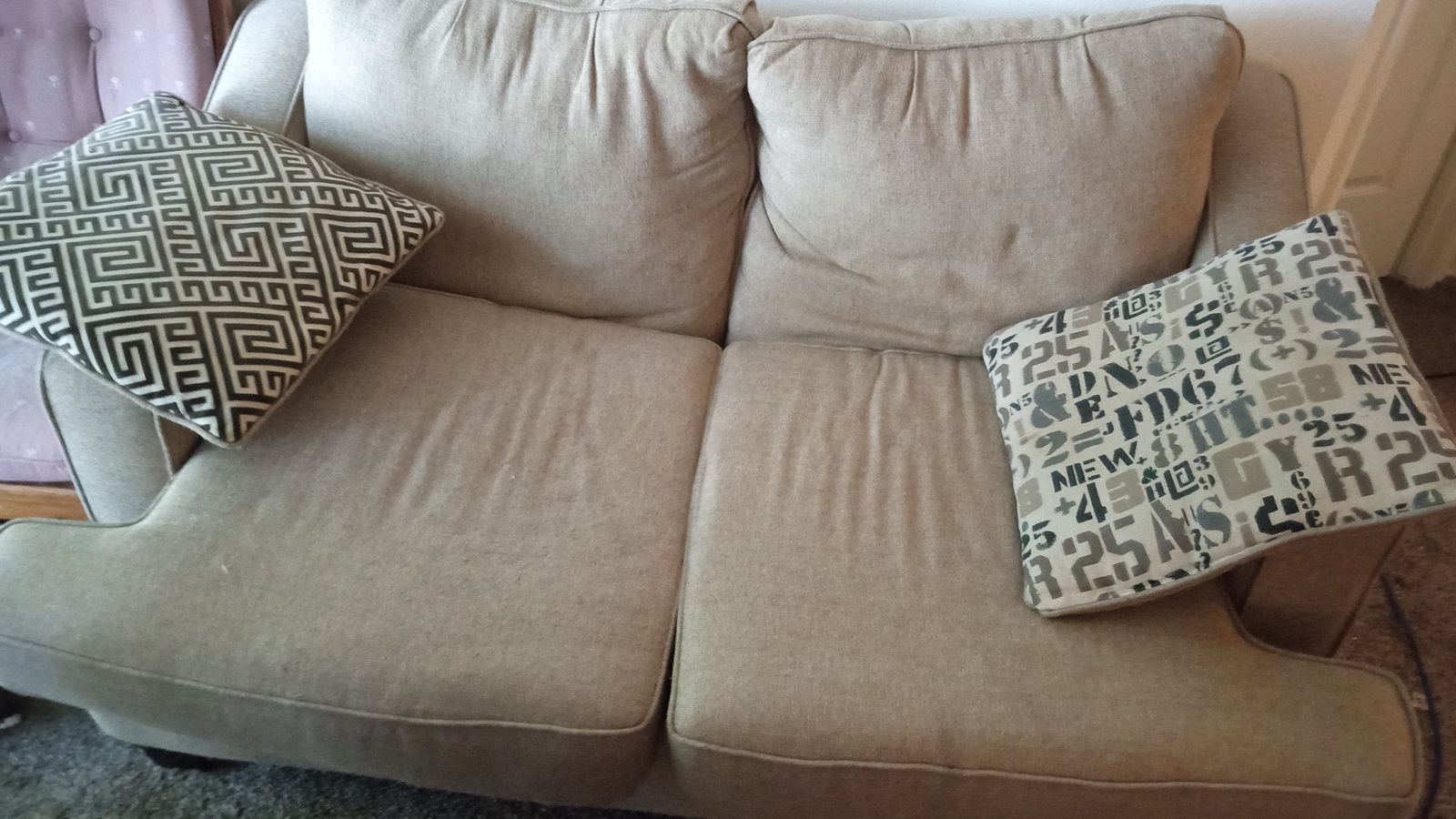 Neutral Tan Upholstered Two-Seater Sofa with Armrests