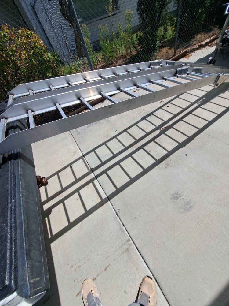 new. 12 foot aluminum arched loading ramps