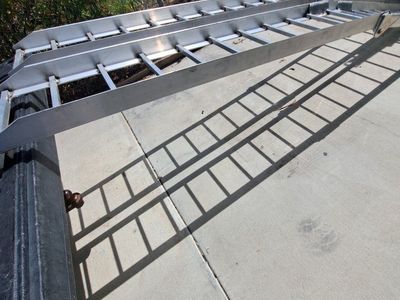 new. 12 foot aluminum arched loading ramps