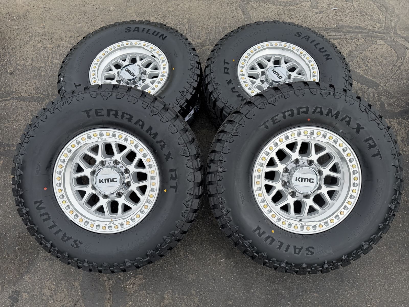 New Silver KMC KM549 GRS 35x12.50r17 Terramax RT 8x6.5 Dodge Ram Cummins Chevy Silverado Duramax GMC wheels and tires 8 lug