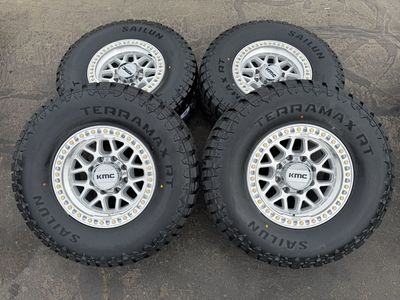 New Silver KMC KM549 GRS 35x12.50r17 Terramax RT 8x6.5 Dodge Ram Cummins Chevy Silverado Duramax GMC wheels and tires 8 lug