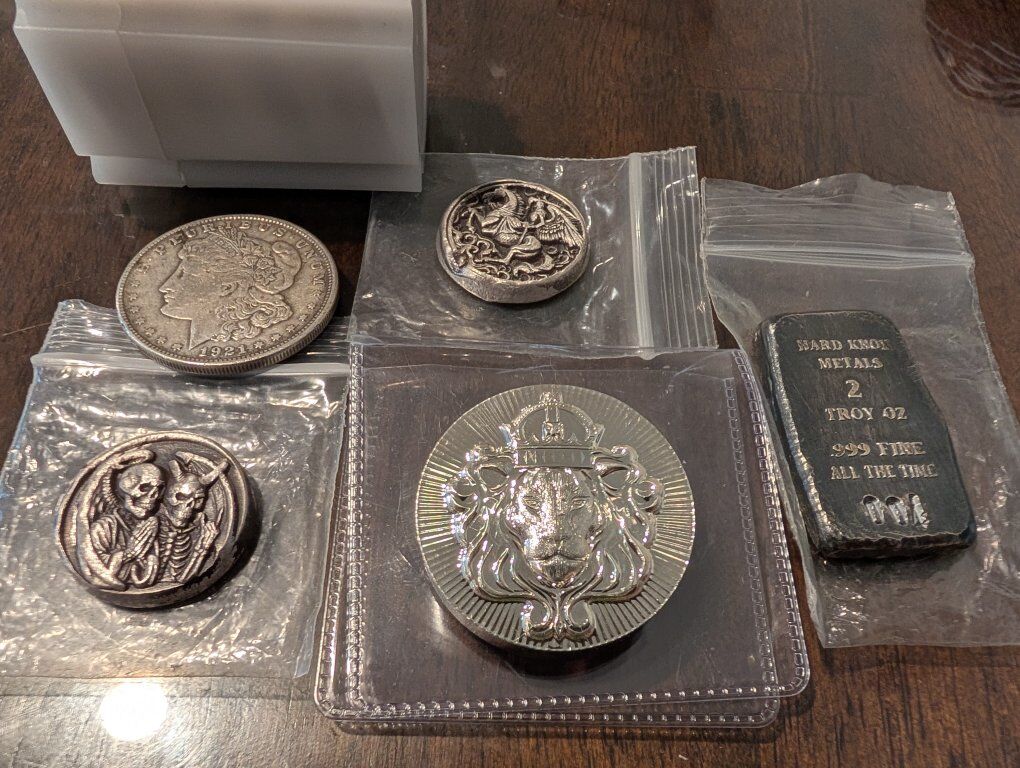 Silver coins and bars (Morgan Dollars, Scottsdale)