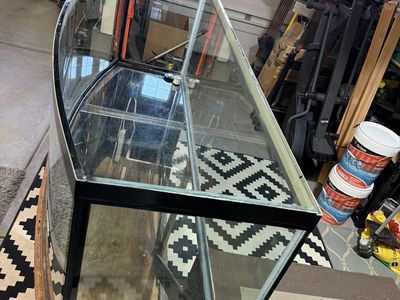 125 gallon Bowfront Glass Aquarium with matching Wooden Stand and All required Equipment.