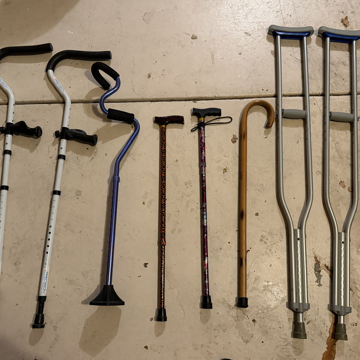 Assorted Canes And Crutches