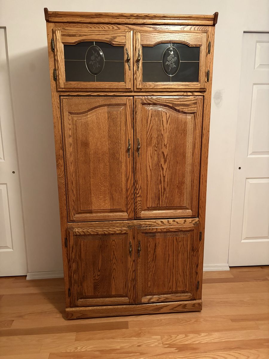 Entertainment center with bookcases.