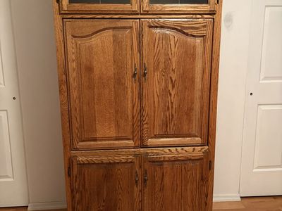 Entertainment center with bookcases.