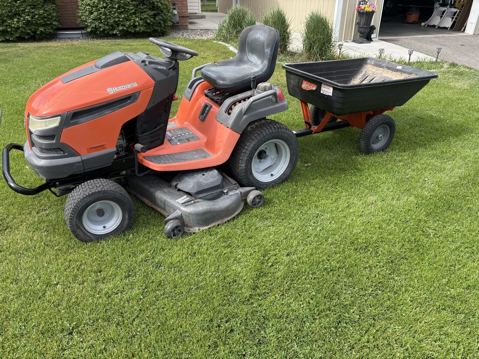 Husquvarna riding mower with trailer
