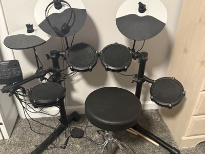 Alesis Debut Kit: Kids Beginner Electronic Drum Set with Headphones and Stool