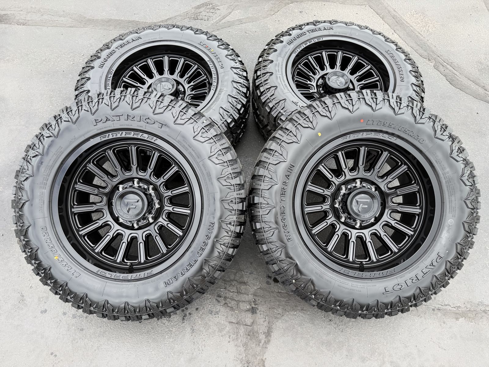 New Fittipaldi Black FA24 LT295/65r20 Patriot RT 35 inch 8 lug 8x170 Ford F250 F350 Superduty Powerstroke wheels and tires