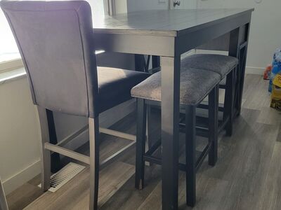 Table w/2 stools and chair