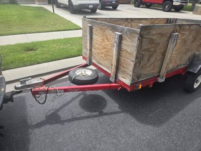 Utility Trailer with Wood Sides and Spare Tire - Versatile Hauling Solution