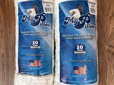 Two new queen premium MyPillows medium firmness - never out of bag.