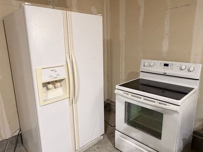 Electric Whirlpool Fridge and Stove