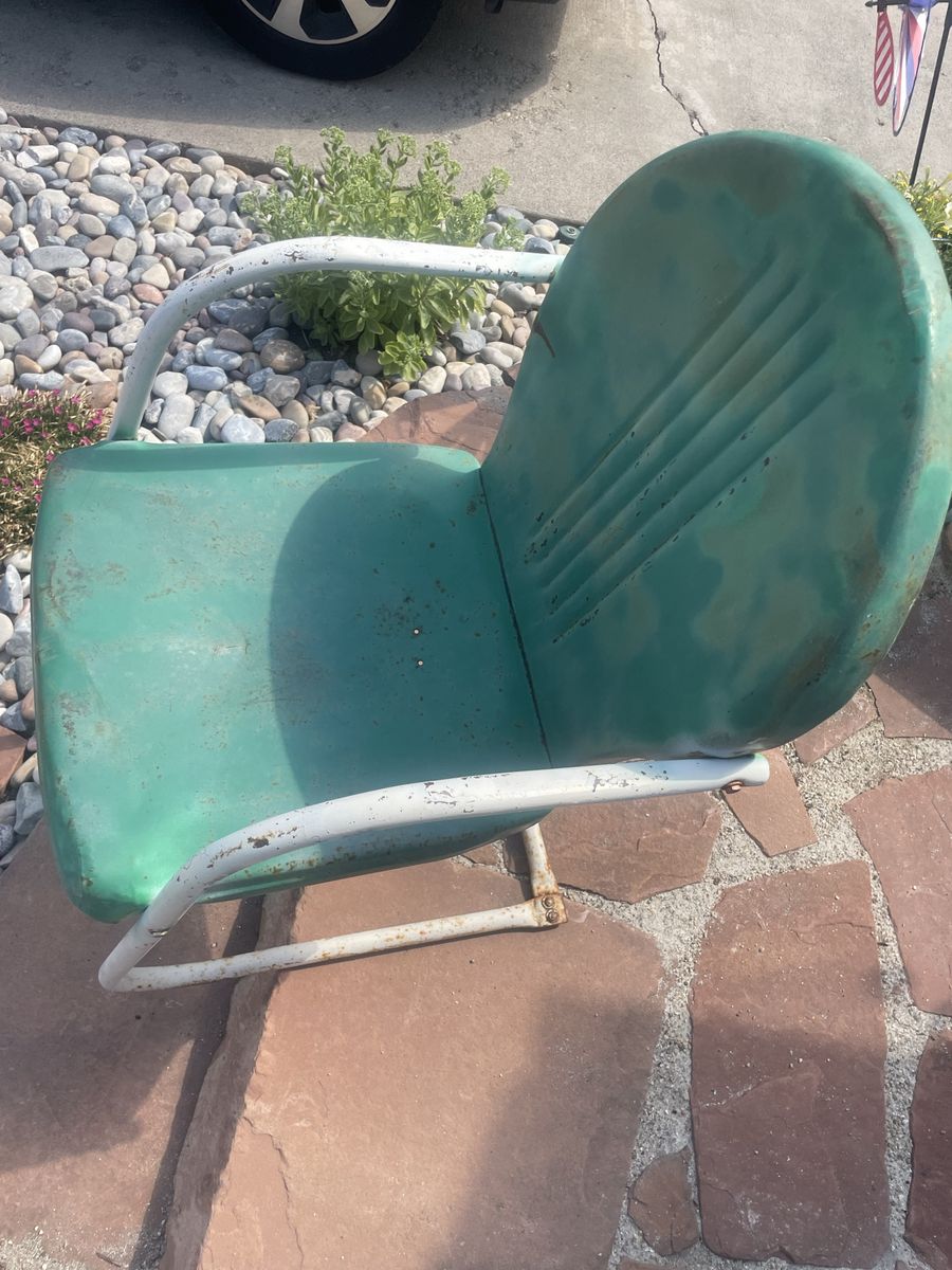 Vintage shell back metal yard chair 