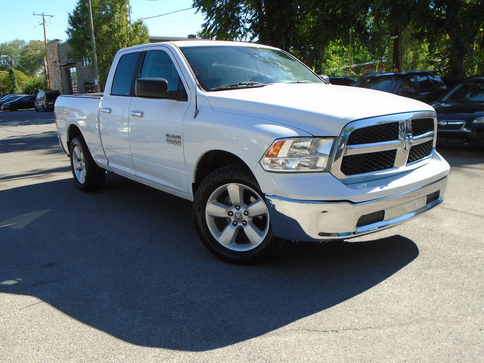2013 RAM 1500 SLT — rebuilt & branded title, 9% below market