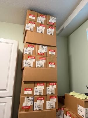 Cases of white shoes/gift boxes
