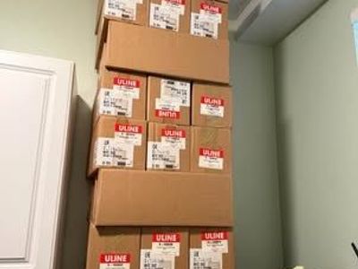 Cases of white shoes/gift boxes
