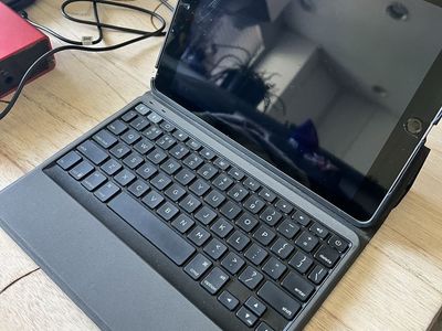 iPad 5th Gen + ZAGG Keyboard + ZAGG rugged case